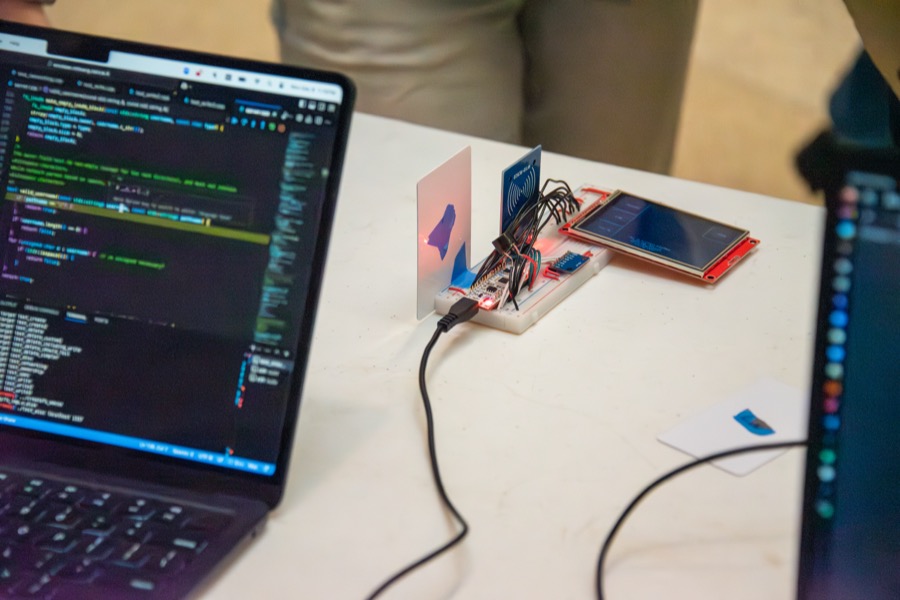 Teams demonstrating their projects at the EECS 373 Embedded System Expo, photo 5