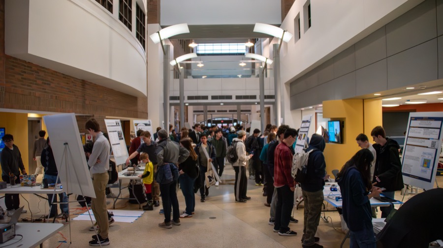 Teams demonstrating their projects at the EECS 373 Embedded System Expo, photo 7